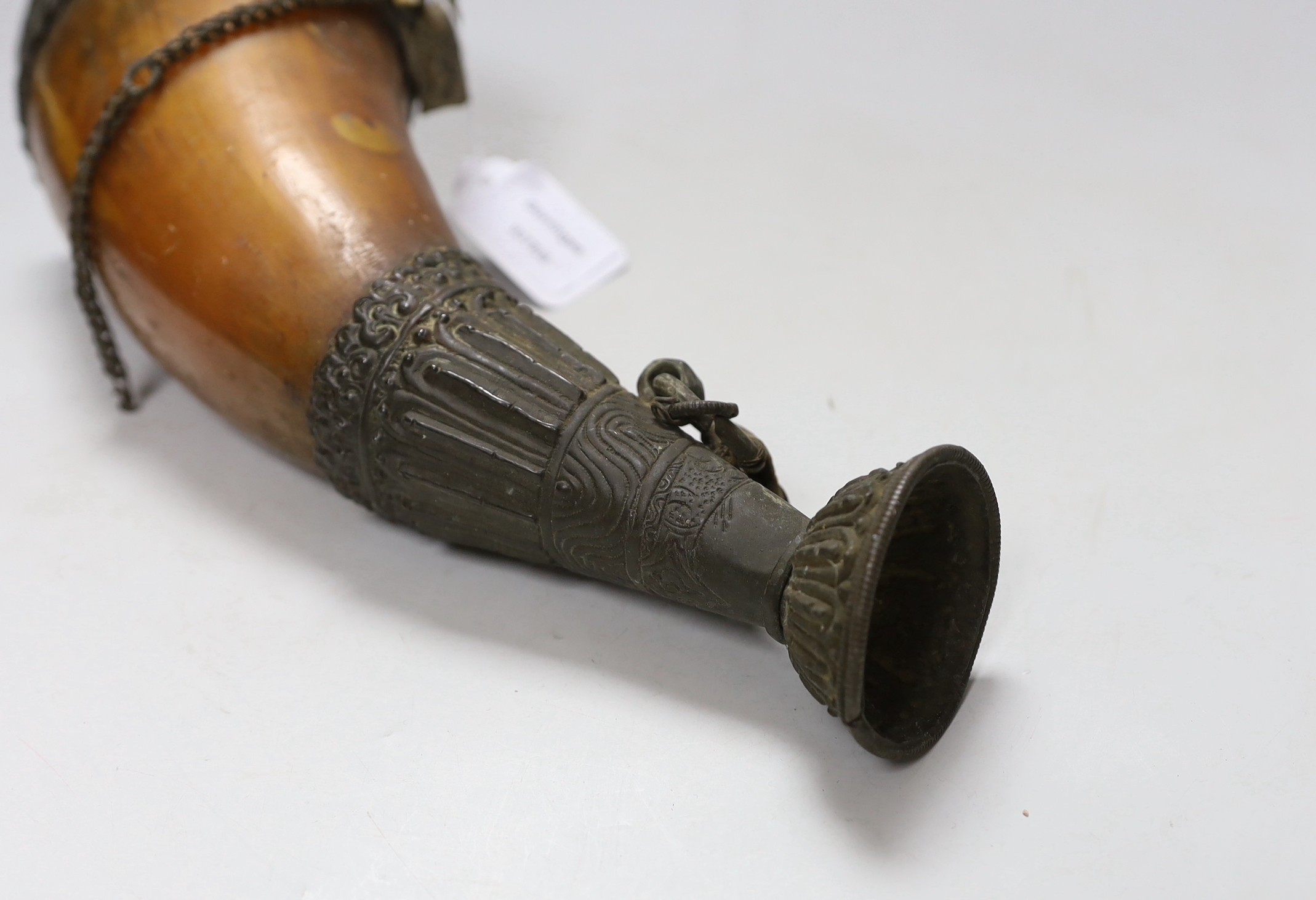 A large Tibetan metal mounted horn flask, 31cms high
